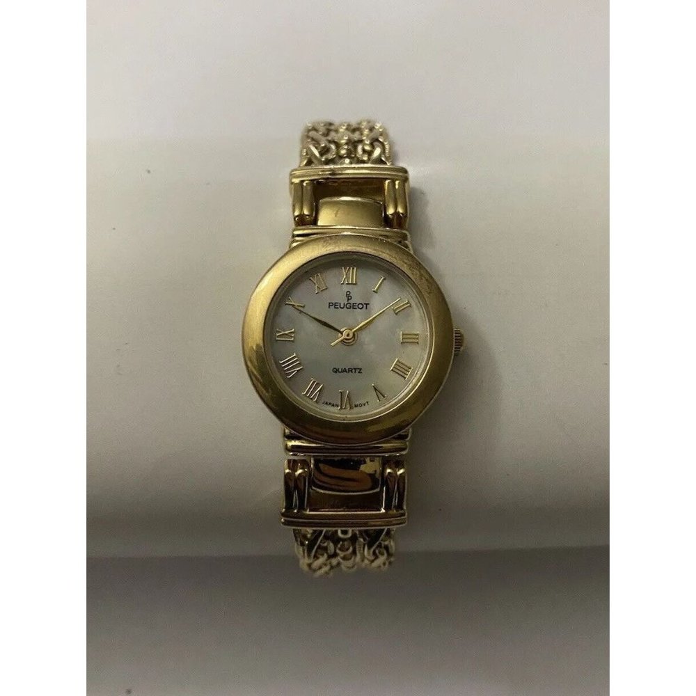PEUGEOT GOLDTONE ADJ.WATCH/MOTHER OF PEARL FACE/INTRICATE DESIGN BRACELET